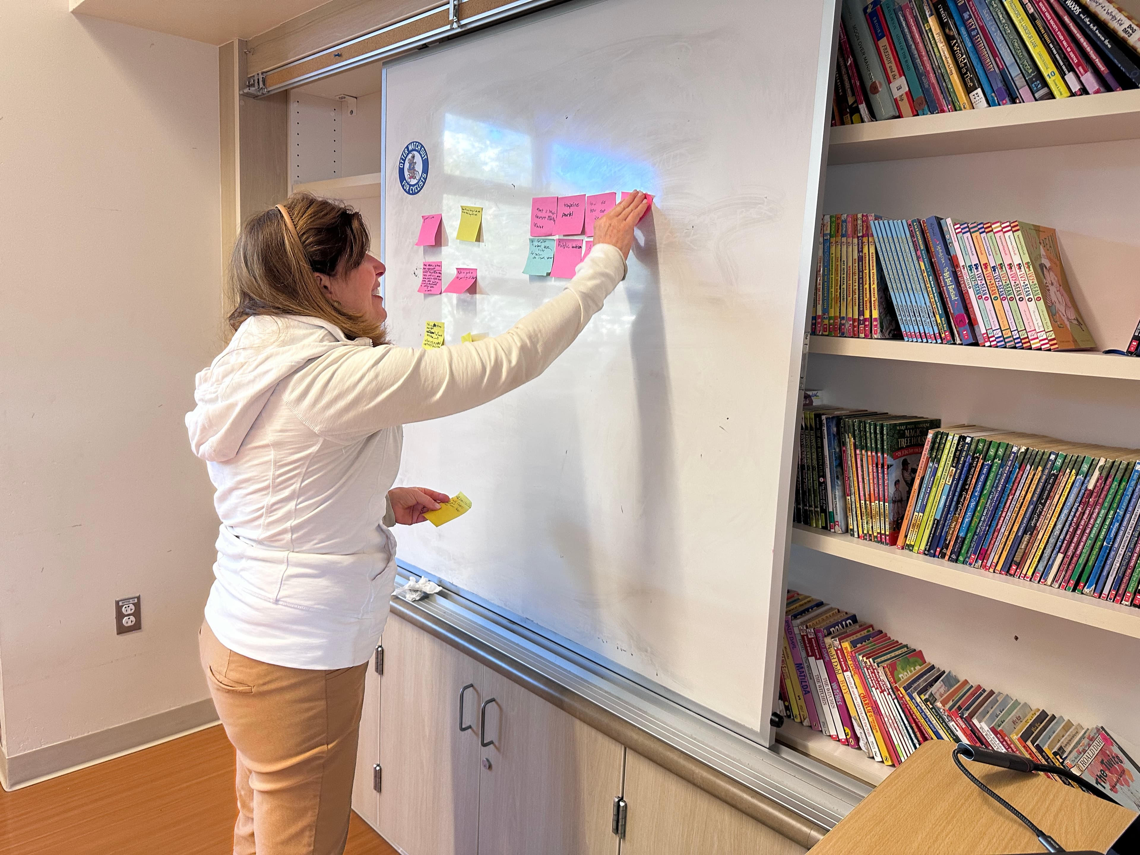 Downtown Menlo Fund cofounder leading the career fair session with post-it notes at Oak Knoll